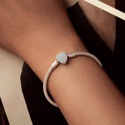 Sterling silver bracelet with heart charm on a silver mesh band for women on Tampa Home & Garden Store