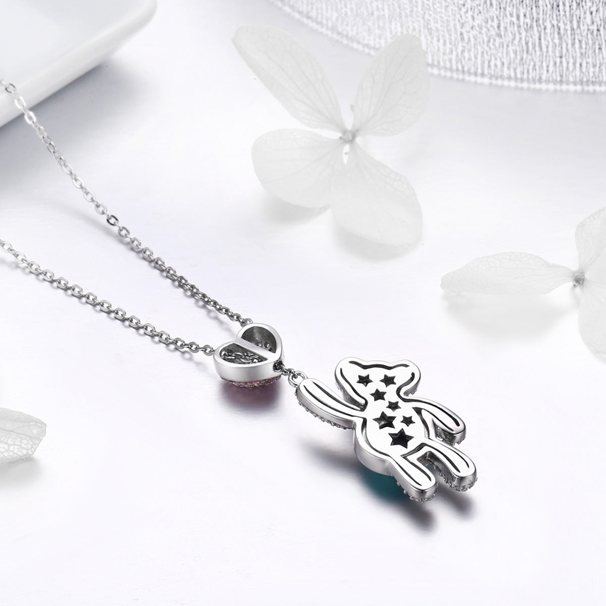 Sterling silver necklace by Bids.com with a heart charm and star-cutout figure pendant, 38-45cm on Tampa Home & Garden Store