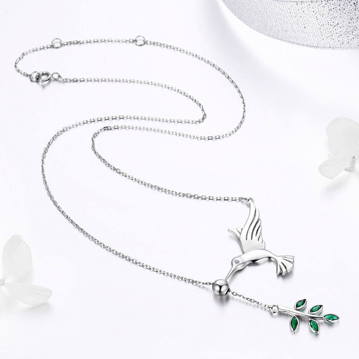Sterling silver necklace with bird pendant and leafy branch, emerald-green stones by Bids.com on Tampa Home & Garden Store