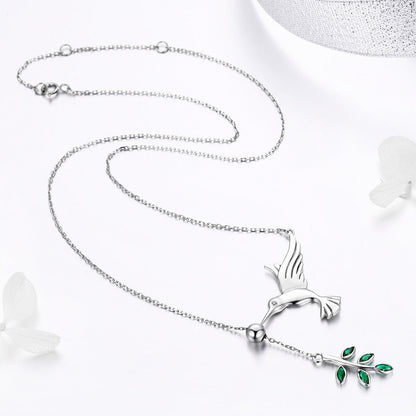 Sterling silver necklace with bird pendant and leafy branch, emerald-green stones by Bids.com on Tampa Home & Garden Store