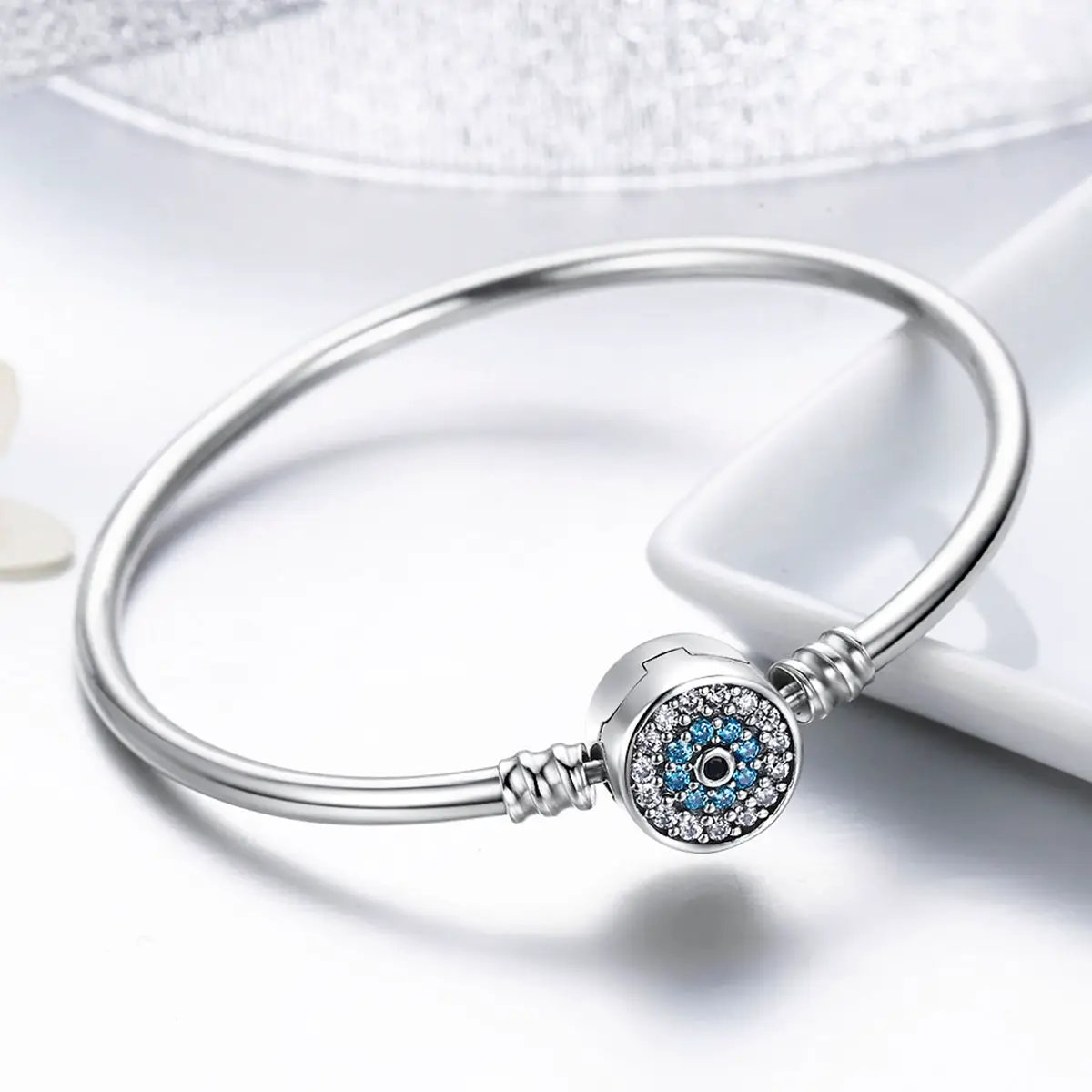 Sterling silver bracelet with pavé crystal disc charm featuring blue stones, size 17 for women on Tampa Home & Garden Store