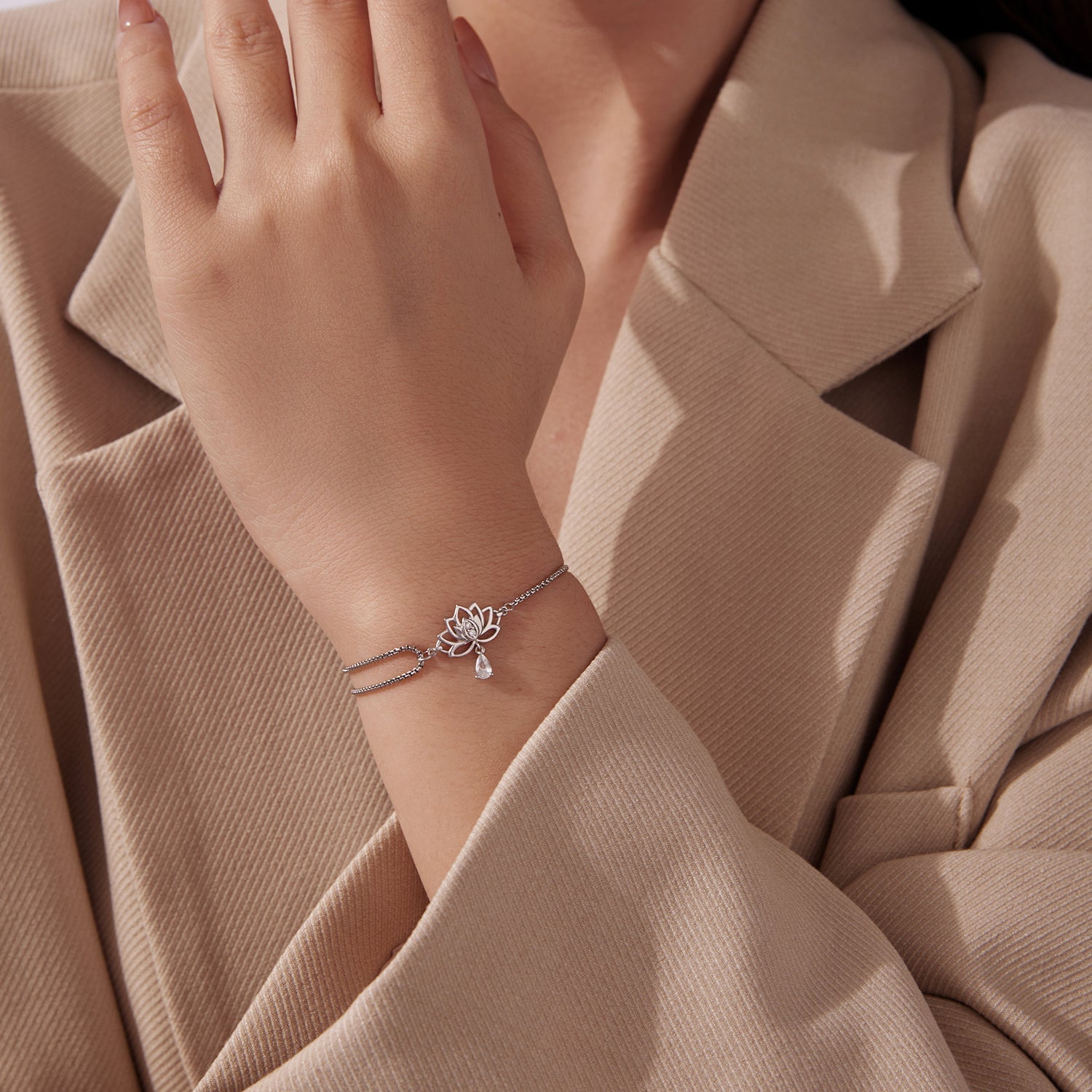 Sterling silver adjustable bracelet with lotus charm and CZ, white gold plated by Bids.com on Tampa Home & Garden Store