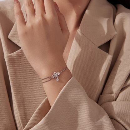 Sterling silver adjustable bracelet with lotus charm and CZ, white gold plated by Bids.com on Tampa Home & Garden Store