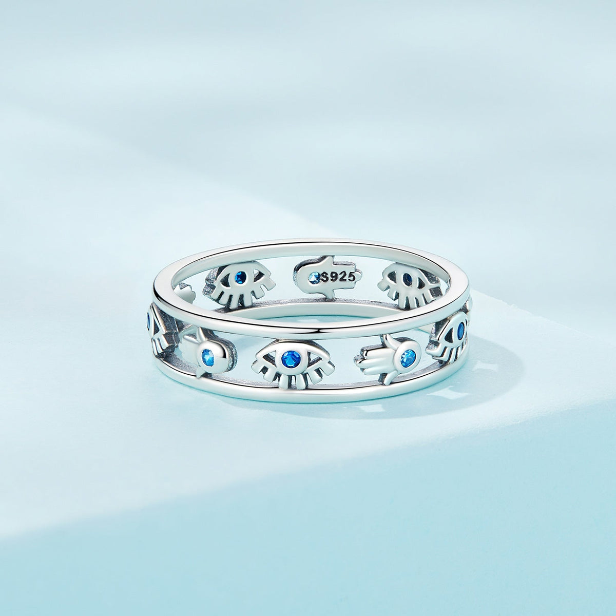 Sterling silver ring with skull motifs and blue CZ eyes, oxidized finish, size 6 on Tampa Home & Garden Store
