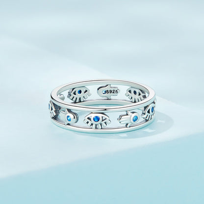 Sterling silver ring with skull motifs and blue CZ eyes, oxidized finish, size 6 on Tampa Home & Garden Store
