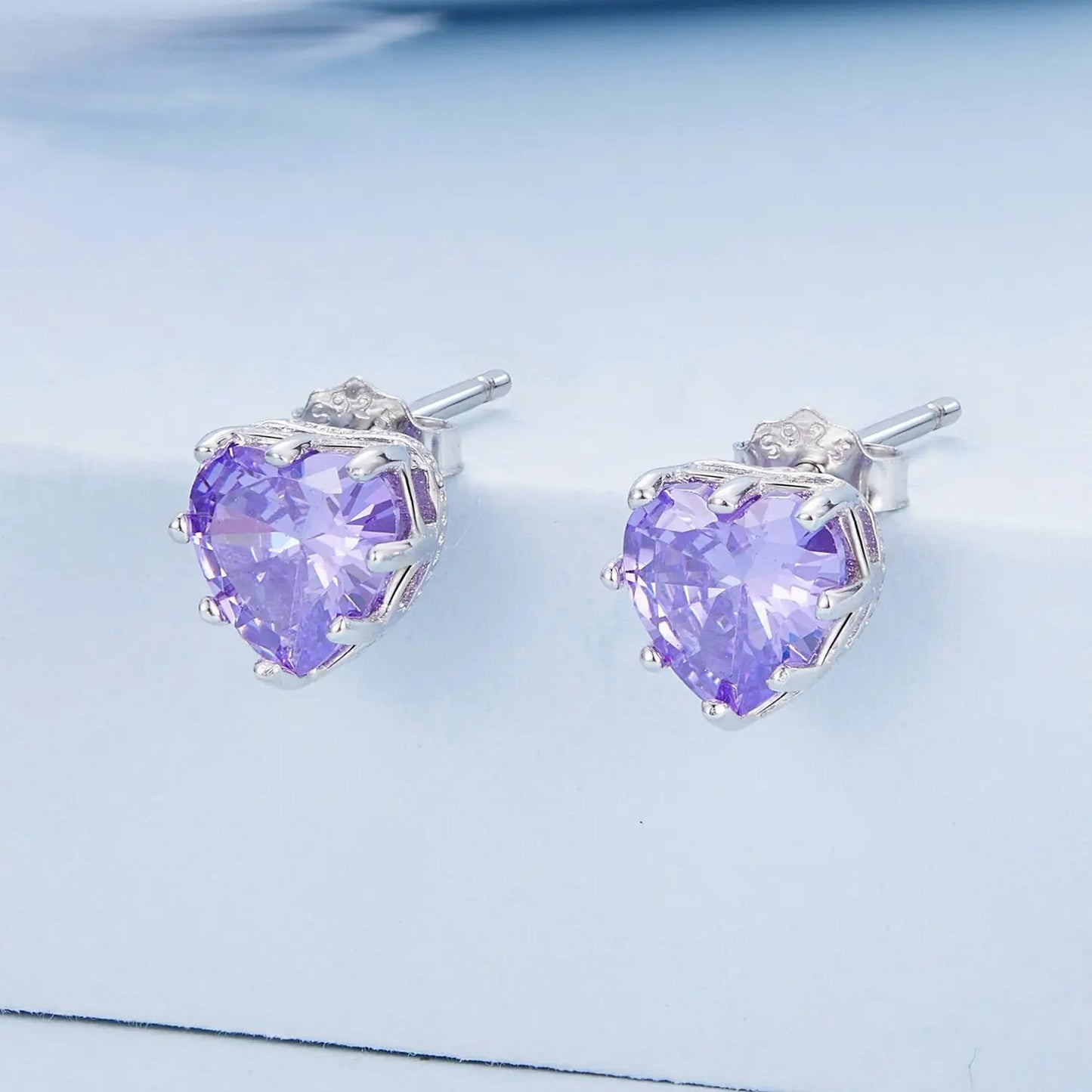 Earrings: 925 sterling silver studs with lavender heart-cut CZ pavé setting, by Bids.com on Tampa Home & Garden Store
