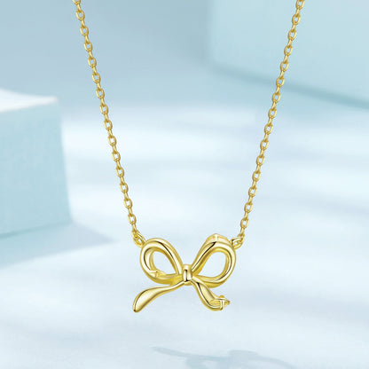 Necklace with gold-tone bow pendant on delicate chain, adjustable 40+5cm on Tampa Home & Garden Store
