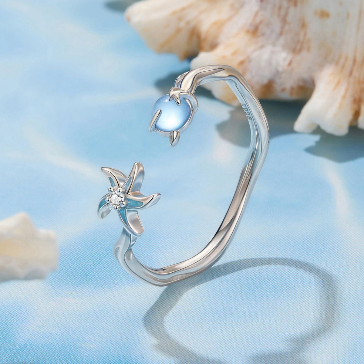 925 Sterling Silver Ring with White Gold Plating featuring blue cabochon and diamond accent on Tampa Home & Garden Store