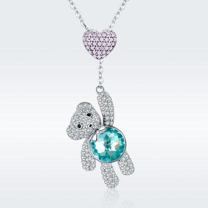 Sterling silver necklace with pink pavé heart pendant and turtle charm with turquoise stone on Tampa Home & Garden Store