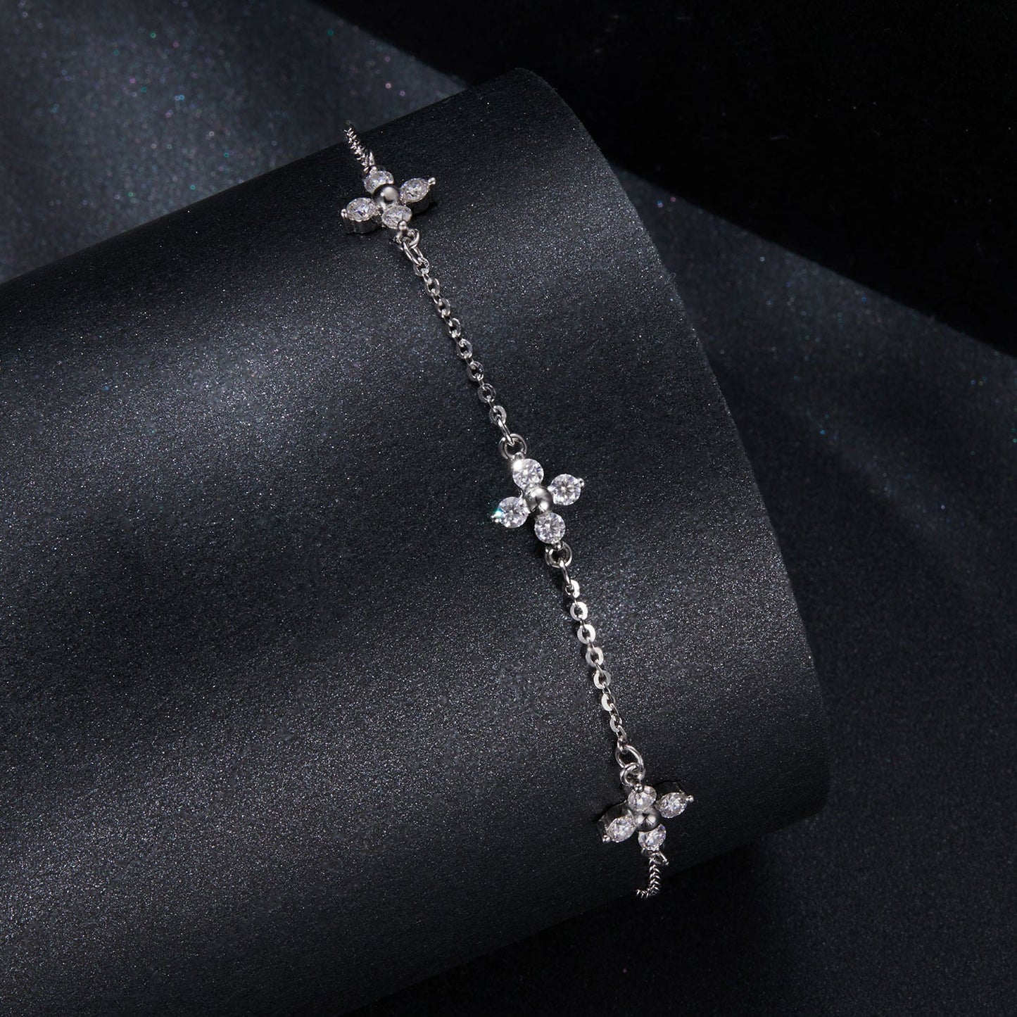 Sterling silver moissanite bracelet with four-petal flower charms, 15+6cm, by Bids.com on Tampa Home & Garden Store