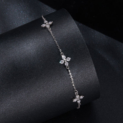 Sterling silver moissanite bracelet with four-petal flower charms, 15+6cm, by Bids.com on Tampa Home & Garden Store