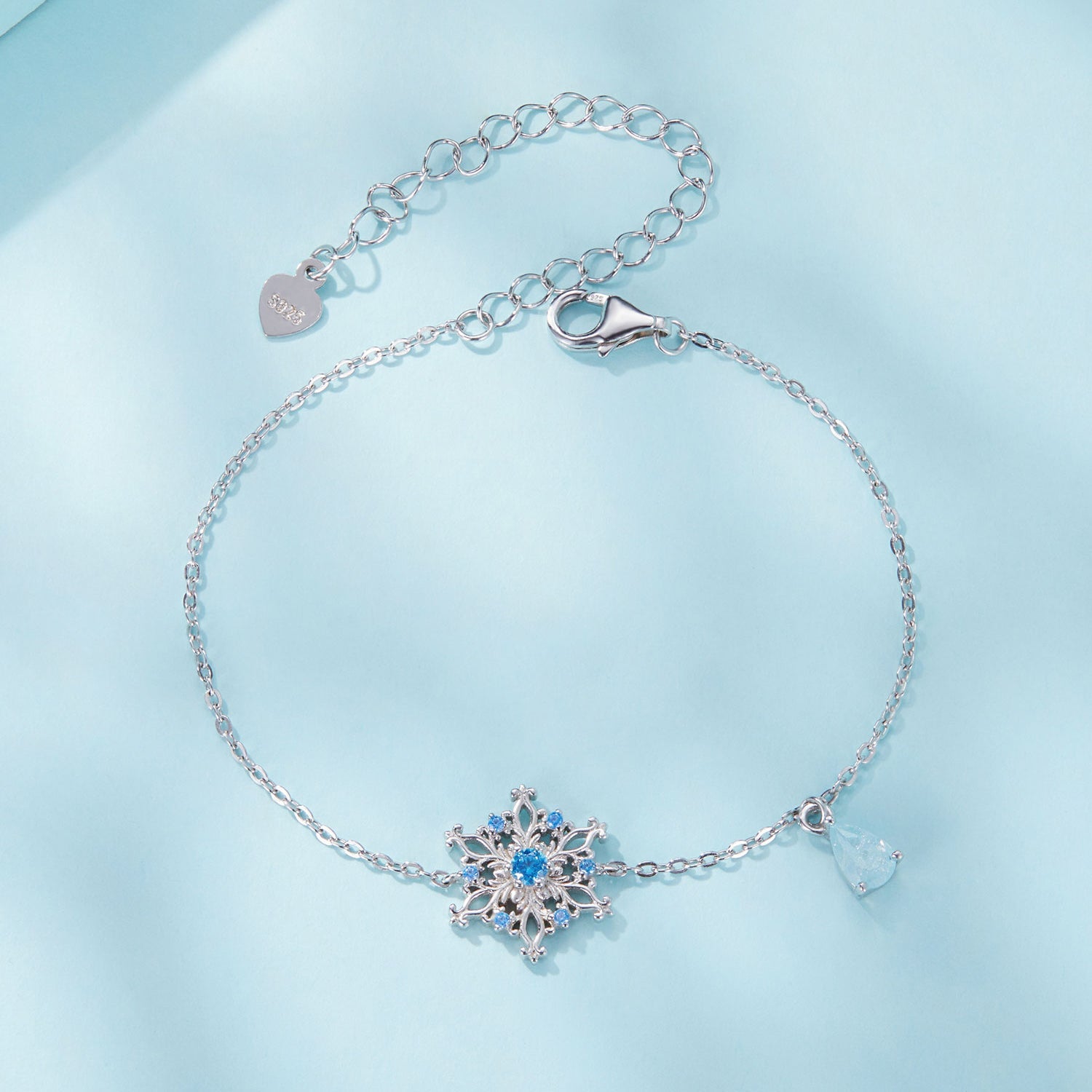 Bracelet: 925 sterling silver plated with ice flower zirconia centerpiece and heart charm on Tampa Home & Garden Store