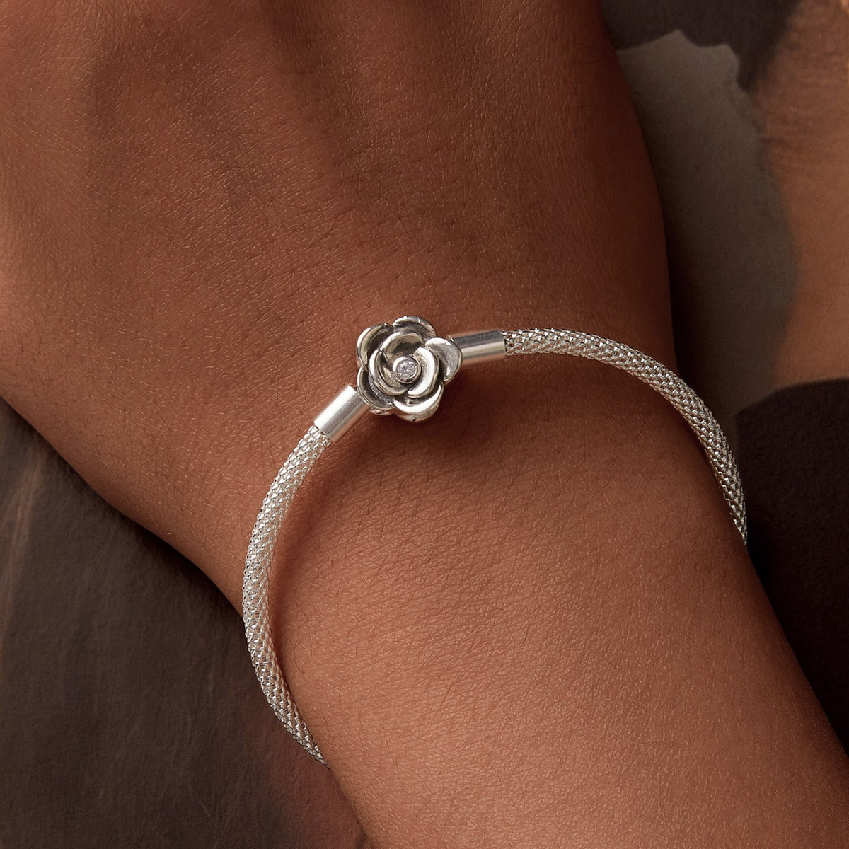 Sterling silver bracelet with oxidized finish and CZ flower charm, 17 cm length, by Bids.com on Tampa Home & Garden Store