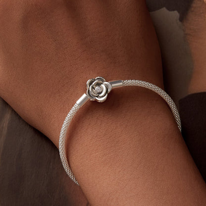 Sterling silver bracelet with oxidized finish and CZ flower charm, 17 cm length, by Bids.com on Tampa Home & Garden Store