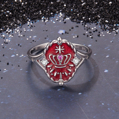 Sterling silver ring with red enamel shield crown detail and two side stones on Tampa Home & Garden Store