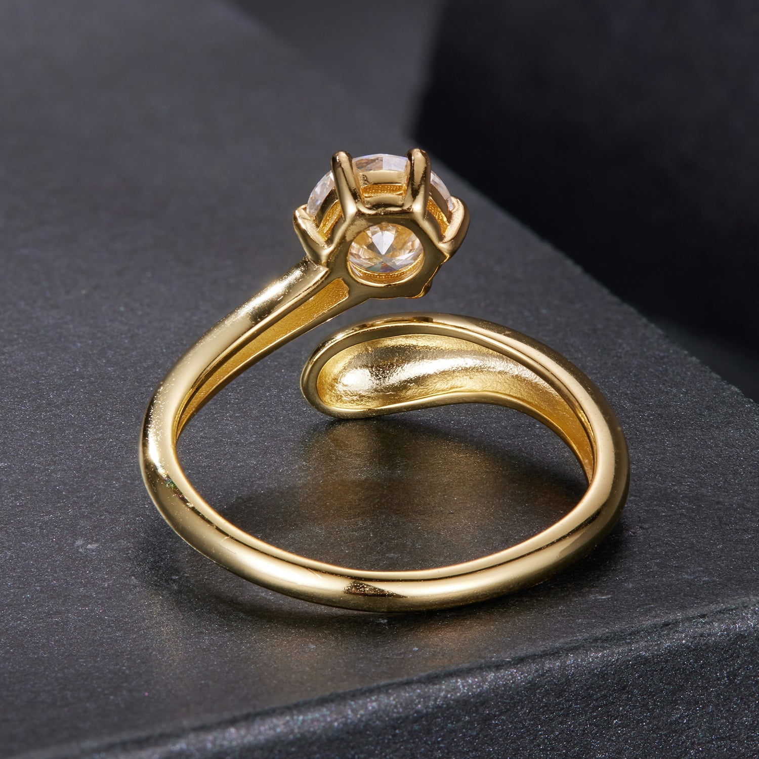 Gold-tone moissanite ring with a round center stone set in a four-prong head by Bids.com on Tampa Home & Garden Store