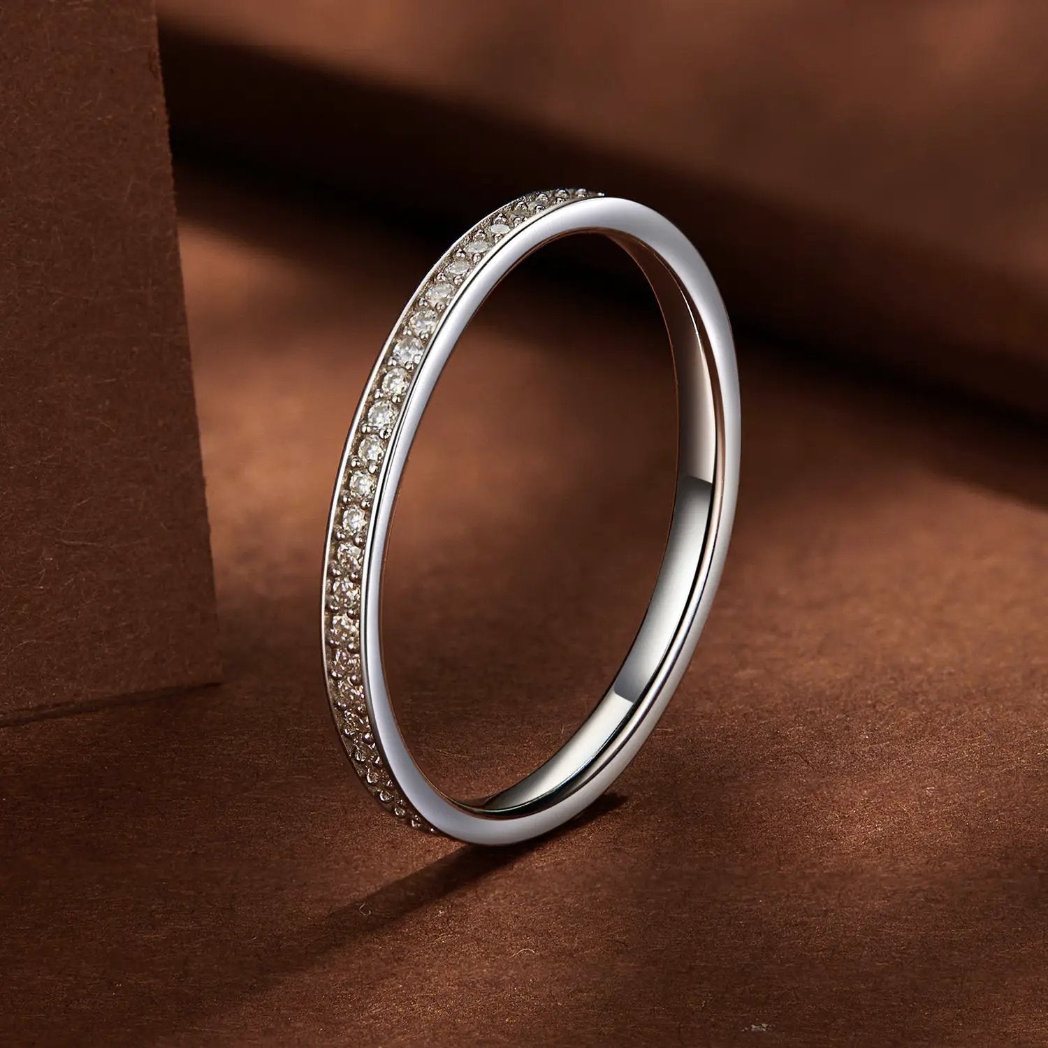 Sterling silver ring with platinum plating and pavé moissanite stones along band size 5 on Tampa Home & Garden Store