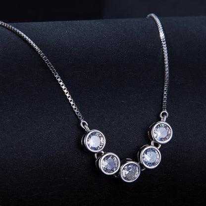 Necklace: 5 bezel-set moissanite stones, platinum-plated sterling silver, 4mm on box chain on Tampa Home & Garden Store