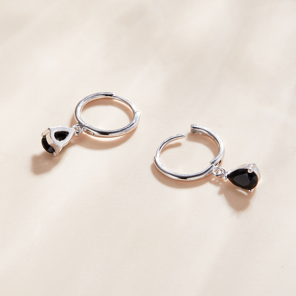 Pair of 925 Sterling Silver Hoop Earrings with black teardrop charms on Tampa Home & Garden Store