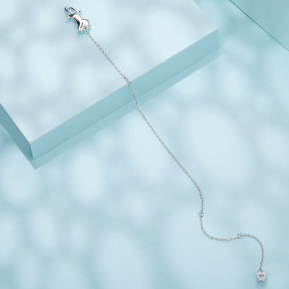 Sterling silver bracelet with heart pendant on a light blue background on Tampa Home & Garden Store