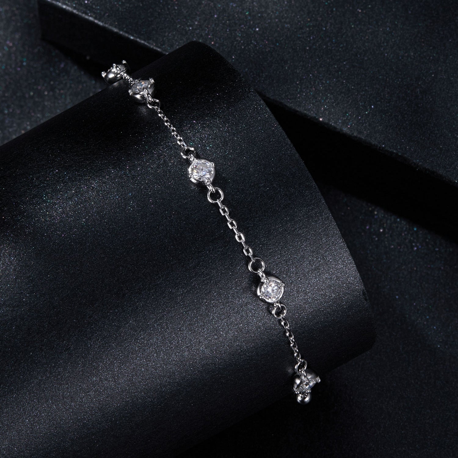 925 Sterling Silver 3mm Moissanite Bracelet for Women by Bids.com on black velvet display on Tampa Home & Garden Store