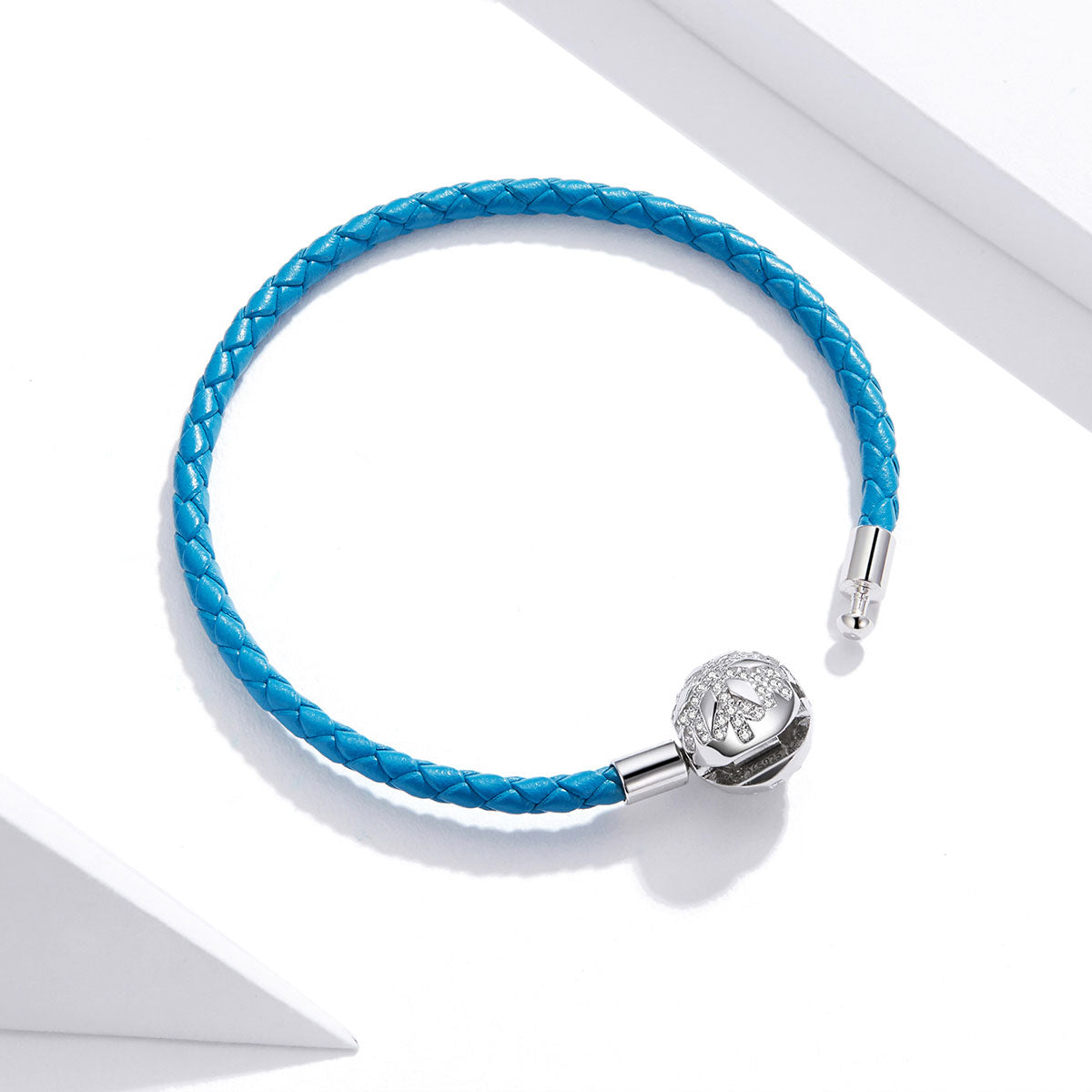 Bracelet blue braided leather with silver end caps and pave CZ ball charm size 19 on Tampa Home & Garden Store