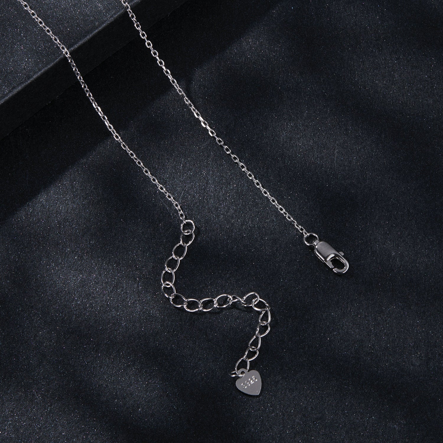 Sterling silver-plated necklace with heart charm stamped 925 and lobster clasp on Tampa Home & Garden Store