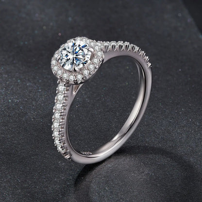 Ring: 925 sterling silver moissanite with halo of pavé stones, pavé band, size 6, Bids.com on Tampa Home & Garden Store
