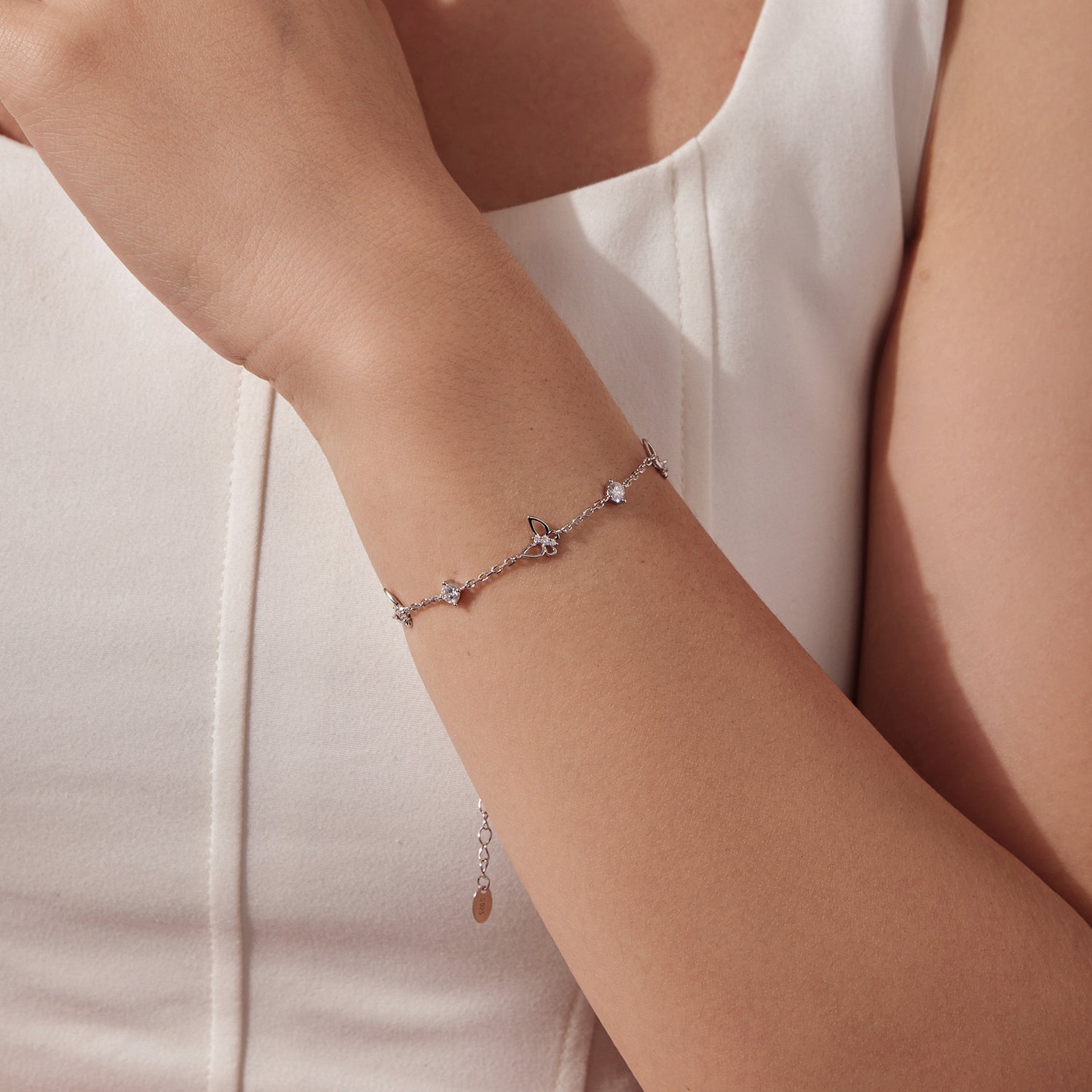 Bracelet by Bids.com, 925 sterling silver white gold plated moissanite, butterfly charms, 15+6 cm on Tampa Home & Garden Store