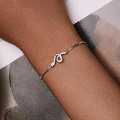 Bracelet: S925 silver, platinum-plated with pavé CZ, curved S-loop centerpiece, thin chain on Tampa Home & Garden Store