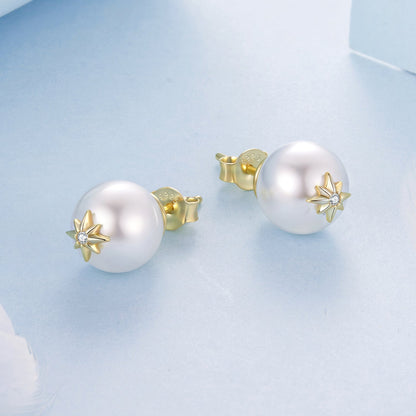 Earrings, pair of 925 sterling silver studs with large white pearl and gold starburst CZ accents on Tampa Home & Garden Store