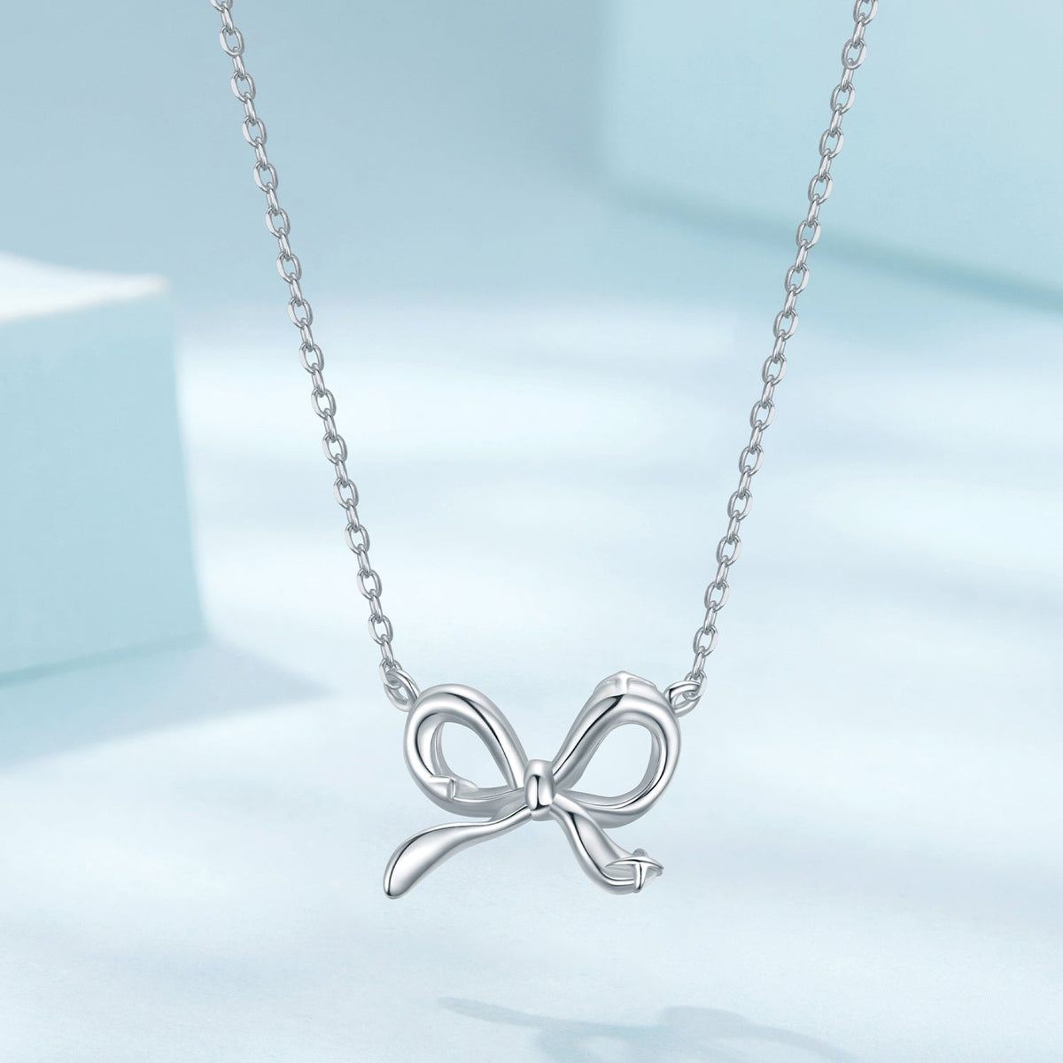 Bow pendant necklace in 925 sterling silver plated white gold finish, adjustable 40+5cm on Tampa Home & Garden Store