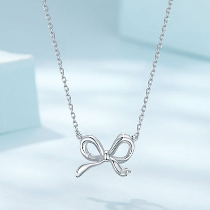Bow pendant necklace in 925 sterling silver plated white gold finish, adjustable 40+5cm on Tampa Home & Garden Store