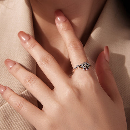 925 Sterling Silver Oxidized Adjustable Ring with a rose motif on a woman's finger on Tampa Home & Garden Store