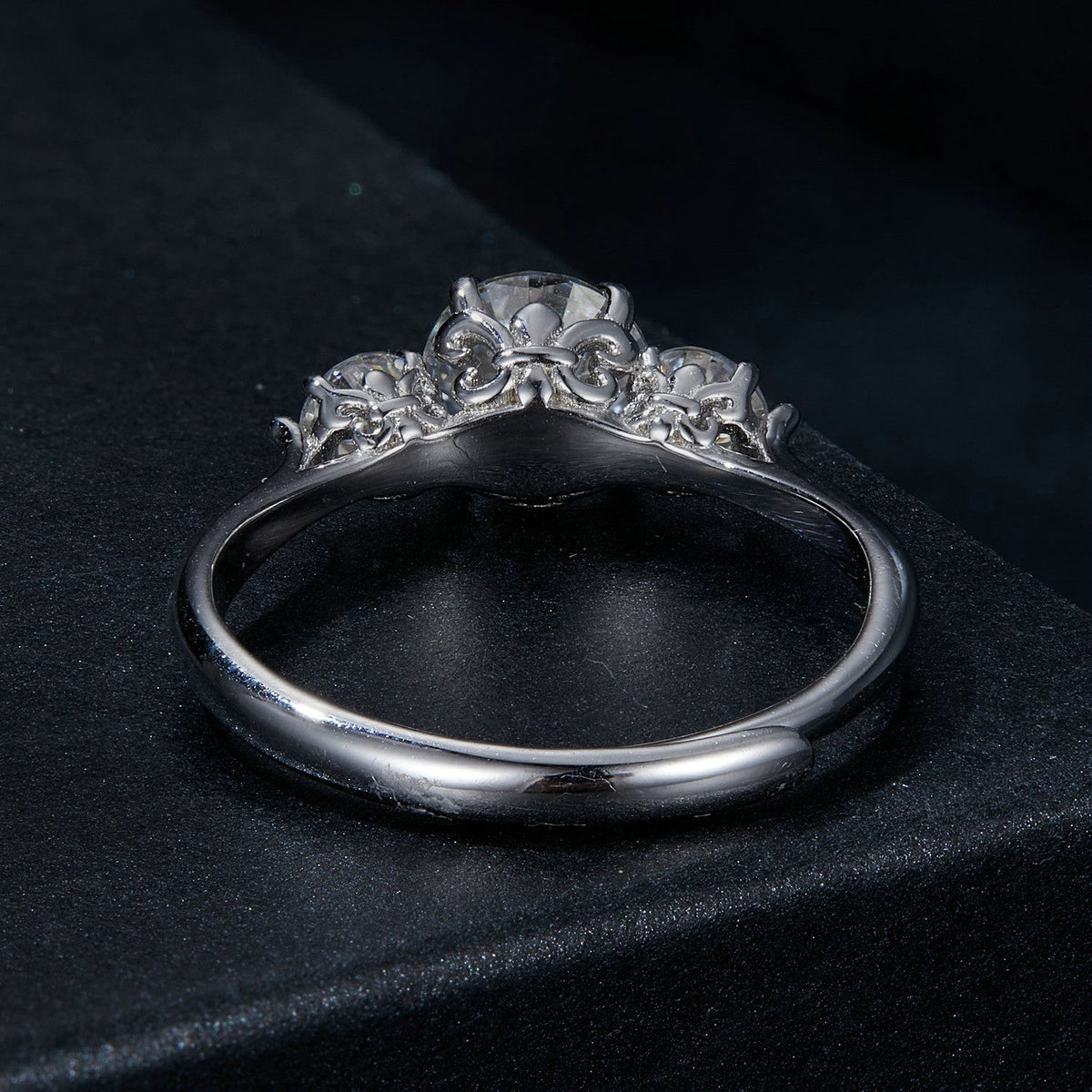 Sterling silver moissanite ring with 6.5mm center stone in filigree crown setting, size E on Tampa Home & Garden Store