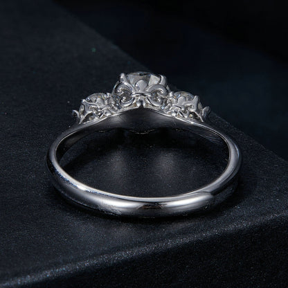 Sterling silver moissanite ring with 6.5mm center stone in filigree crown setting, size E on Tampa Home & Garden Store
