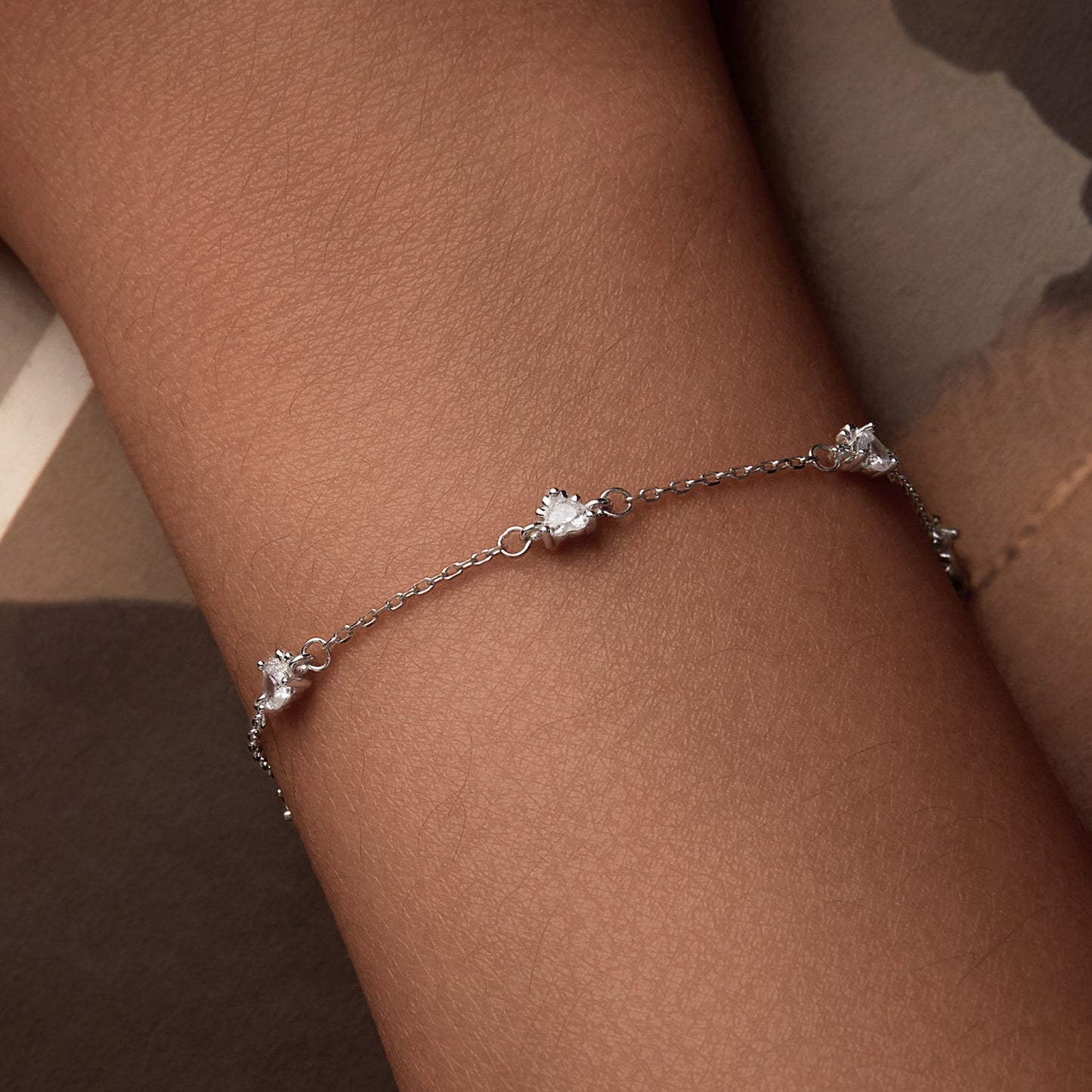 Bracelet 925 sterling silver with pavé CZ stones, white gold plating, delicate chain on wrist on Tampa Home & Garden Store