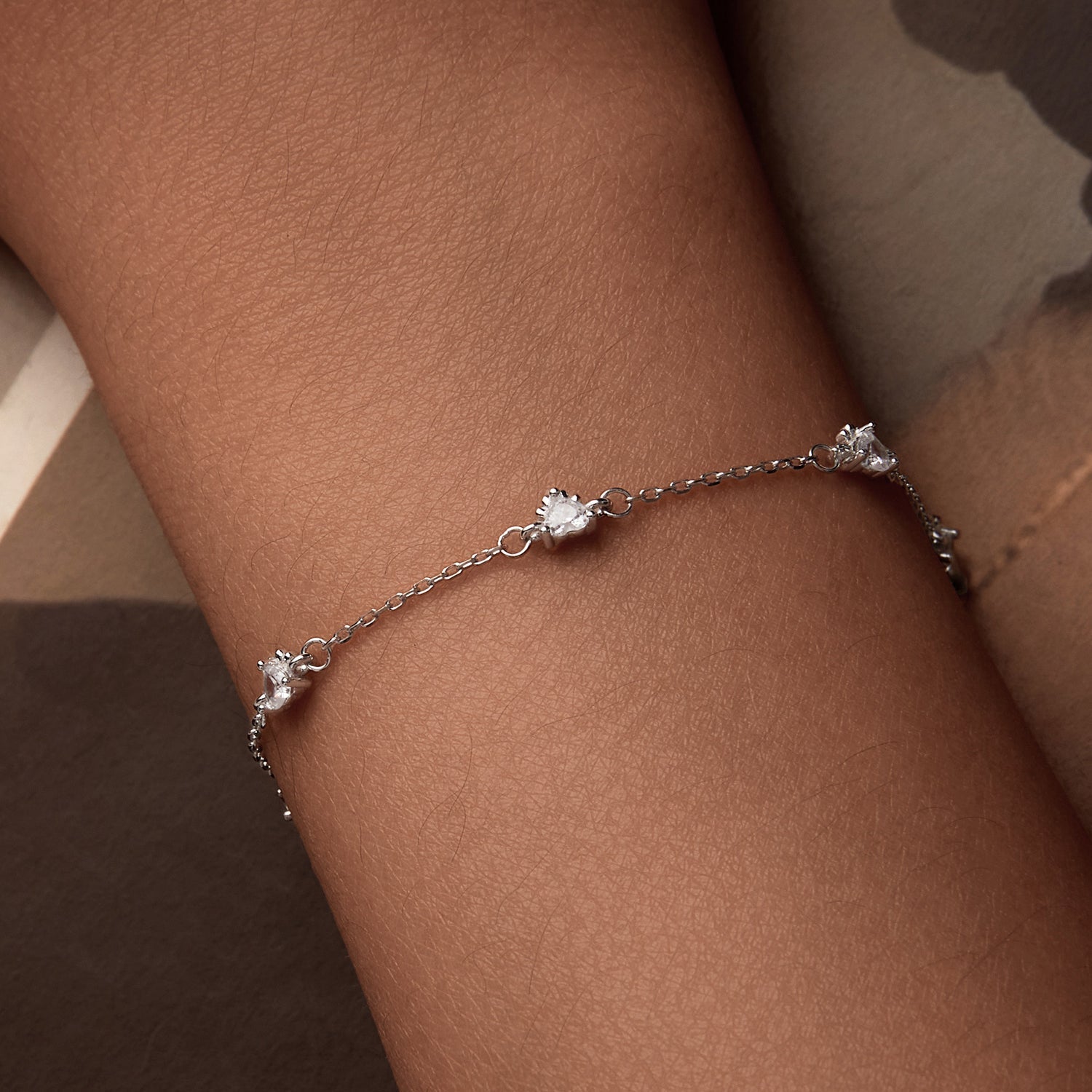 Bracelet 925 sterling silver with pavé CZ stones, white gold plating, delicate chain on wrist on Tampa Home & Garden Store