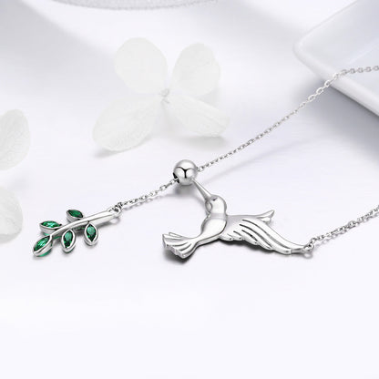 Sterling silver bird pendant necklace with leaves and green gemstones on Tampa Home & Garden Store