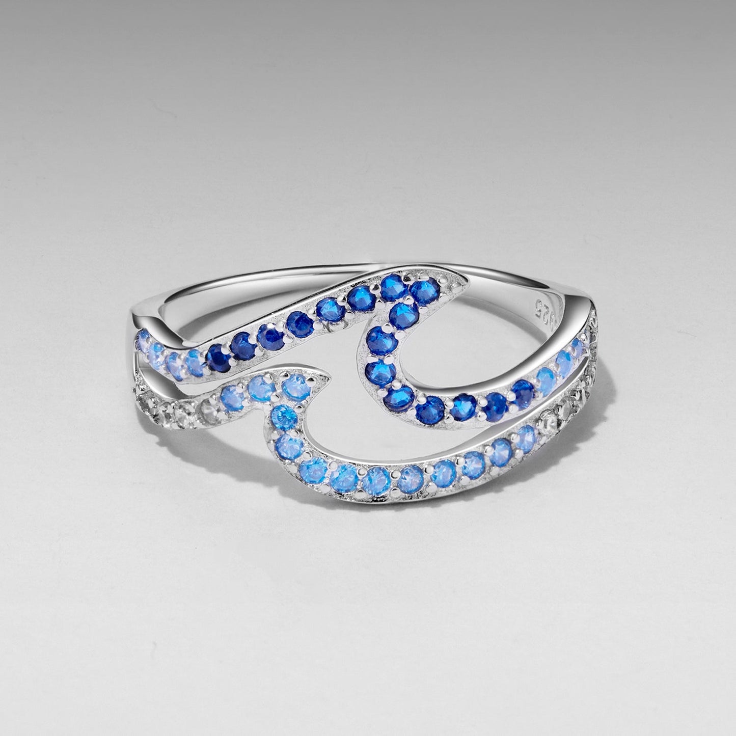 925 Sterling Silver Women's Ring size 6, white gold plated with blue CZs on intertwined curved bands by Bids.com on Tampa Home & Garden Store