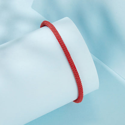 Bracelet men's red rope with twisted-cord texture displayed on light blue backdrop on Tampa Home & Garden Store