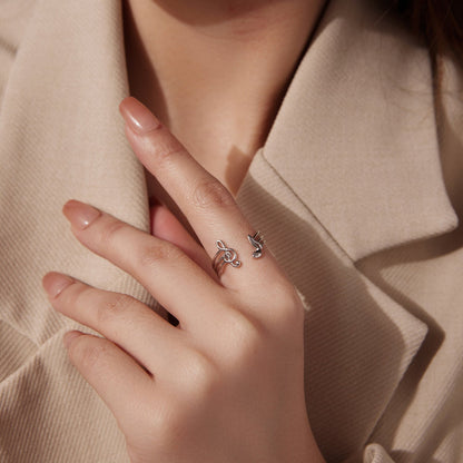 925 Sterling Silver Plated White Gold adjustable rings set of 2 with treble-clef motif on finger on Tampa Home & Garden Store