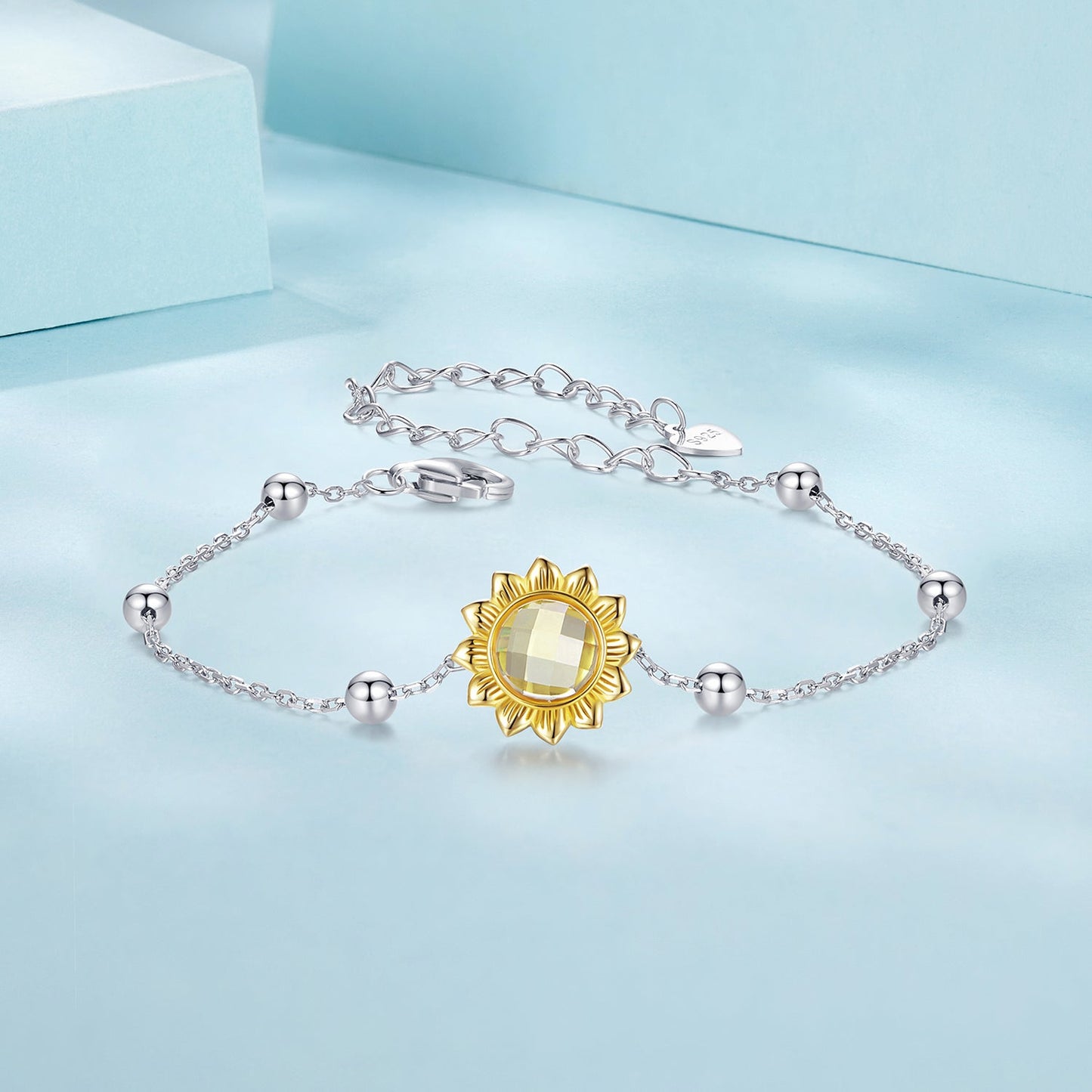 Sunflower charm bracelet in 925 sterling silver with white gold plating and glass center on Tampa Home & Garden Store