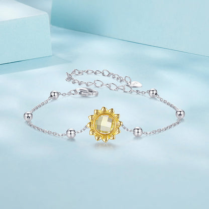 Sunflower charm bracelet in 925 sterling silver with white gold plating and glass center on Tampa Home & Garden Store