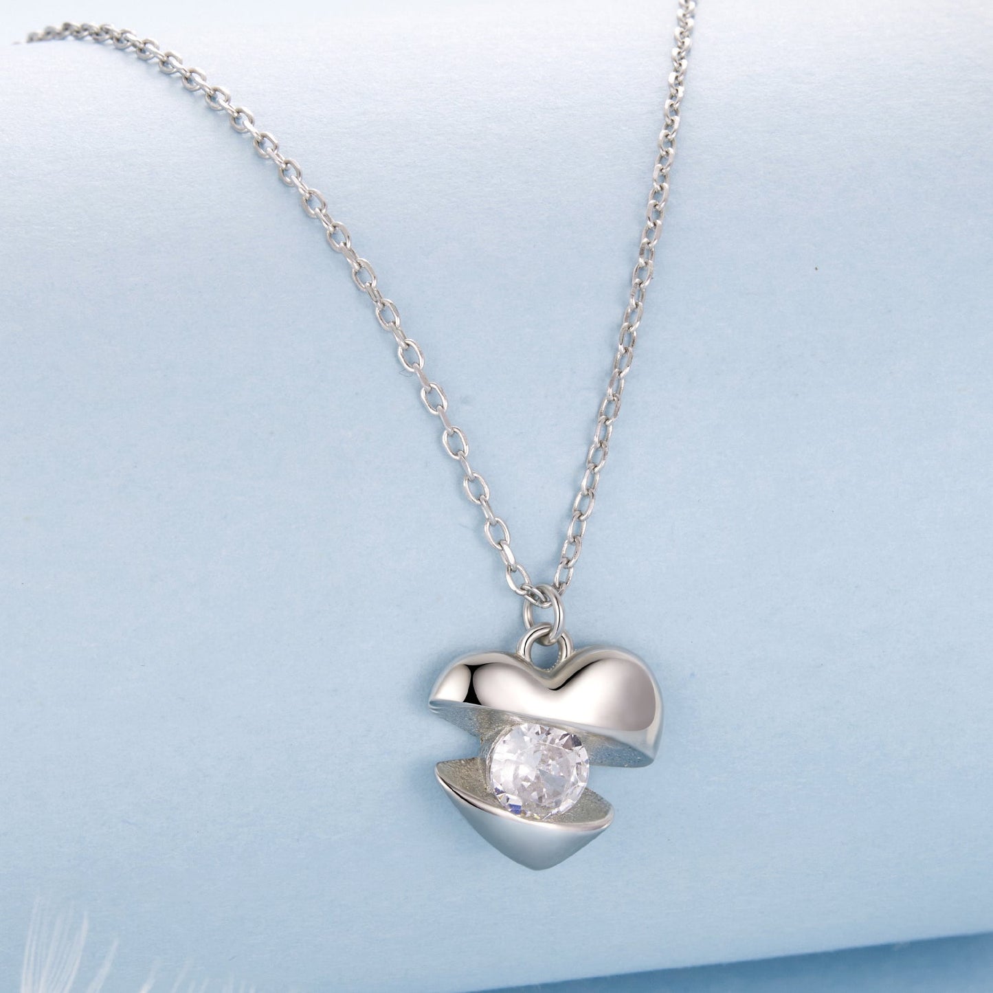 Necklace with a white-gold-plated silver heart pendant featuring a round CZ crystal on a 40cm+5cm chain on Tampa Home & Garden Store