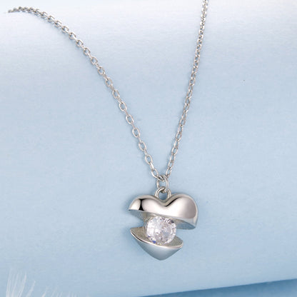 Necklace with a white-gold-plated silver heart pendant featuring a round CZ crystal on a 40cm+5cm chain on Tampa Home & Garden Store