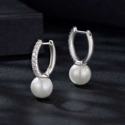 Pair of 925 sterling silver moissanite hoop earrings with shell pearl drops on Tampa Home & Garden Store