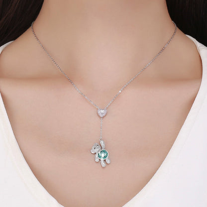 Sterling silver necklace 38-45cm with heart pave charm and bear drop pendant with green gem on Tampa Home & Garden Store