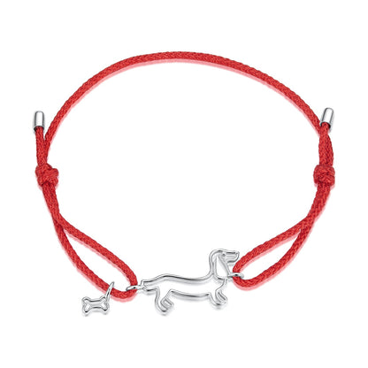 Bracelet: red cotton cord with 925 sterling silver dog pendant and bone charm, Bids.com on Tampa Home & Garden Store