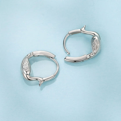 Hoop earrings silver plated white gold finish with wing motif, open hinged design on Tampa Home & Garden Store